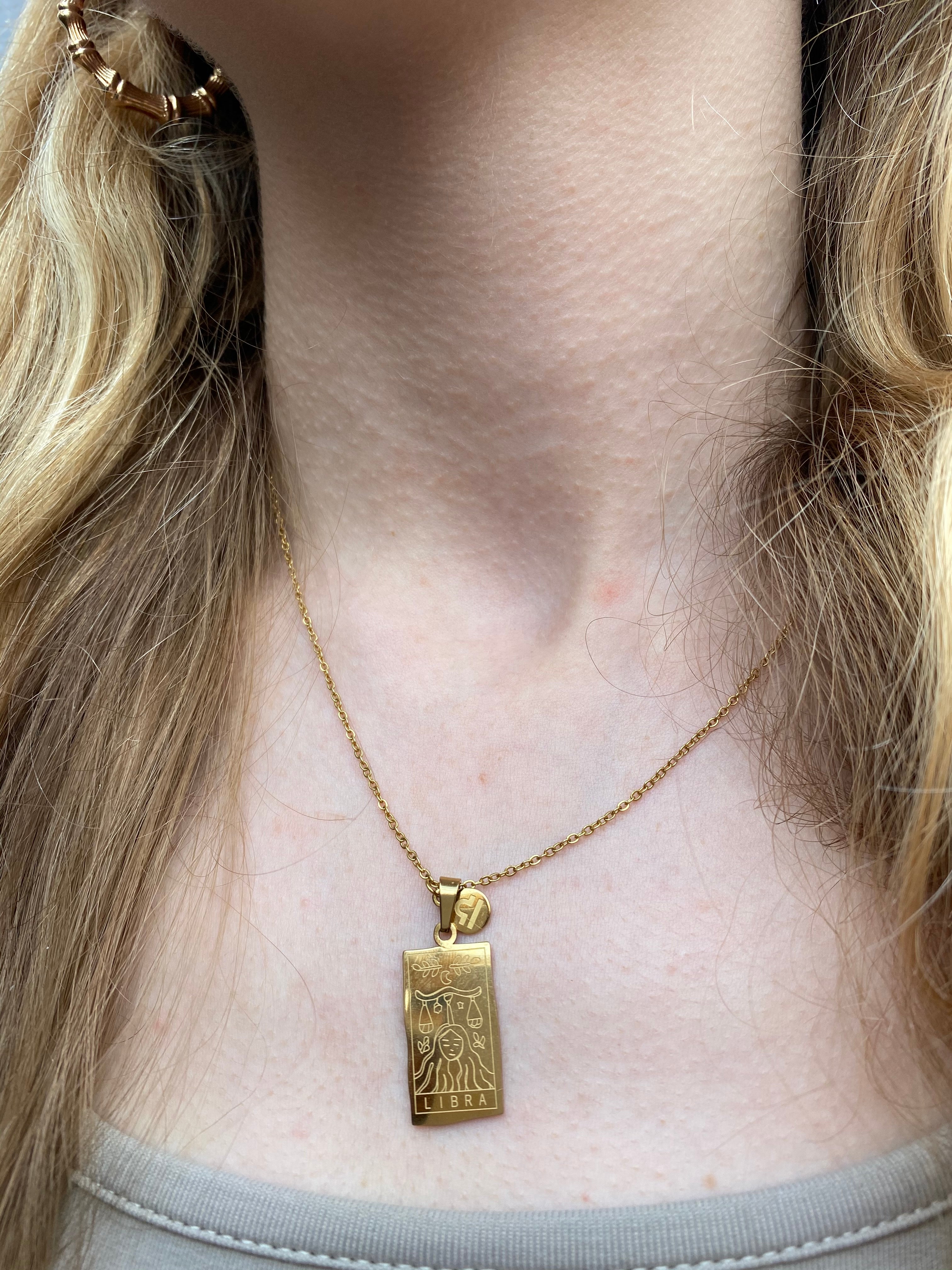 Astraea Gold & Silver Zodiac Pendants