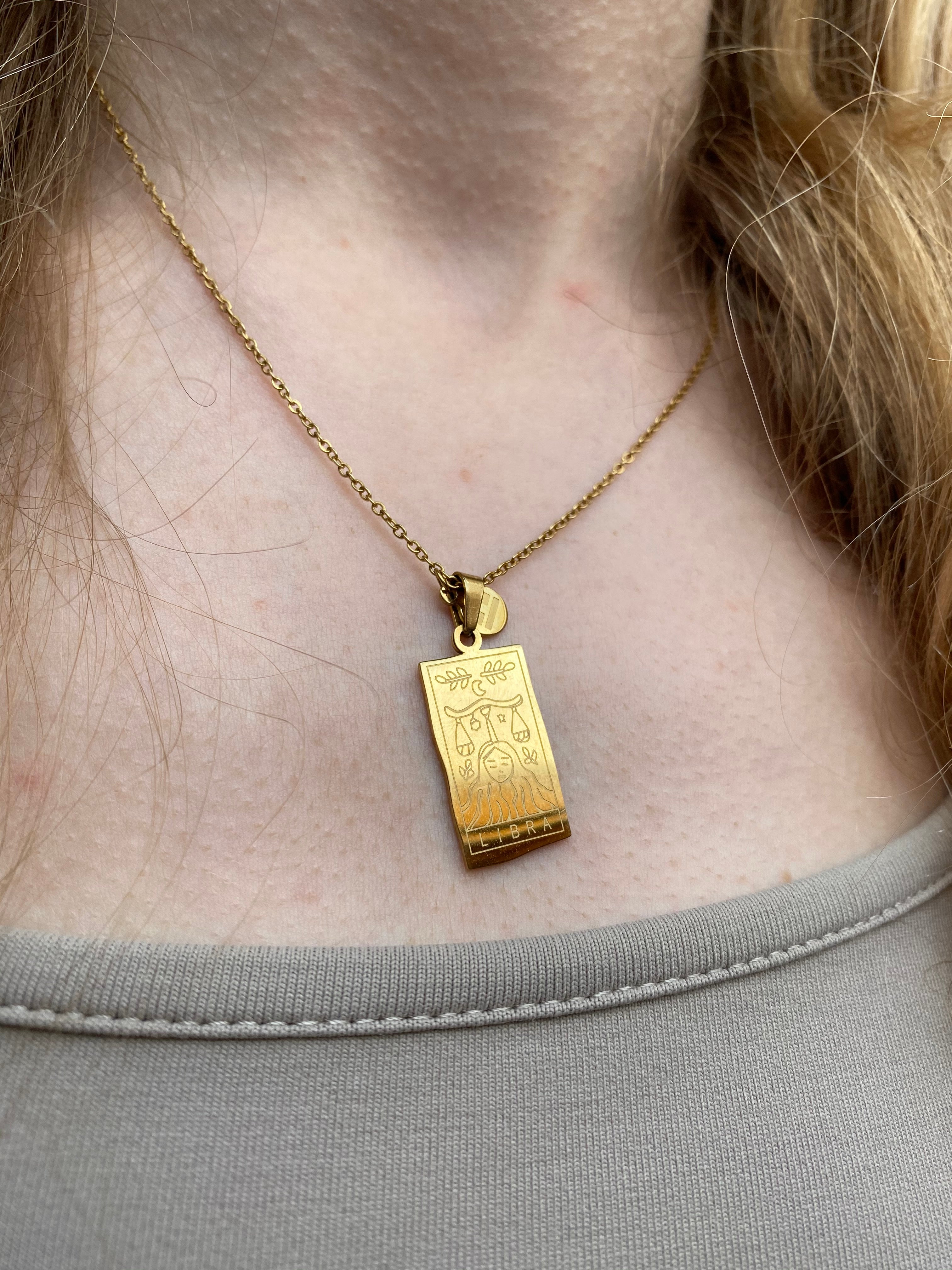 Astraea Gold & Silver Zodiac Pendants