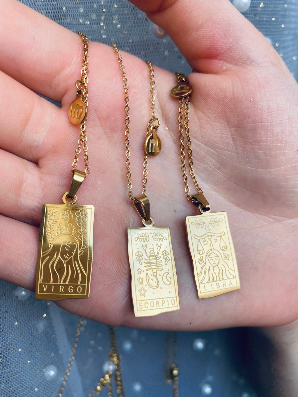 Astraea Gold & Silver Zodiac Pendants