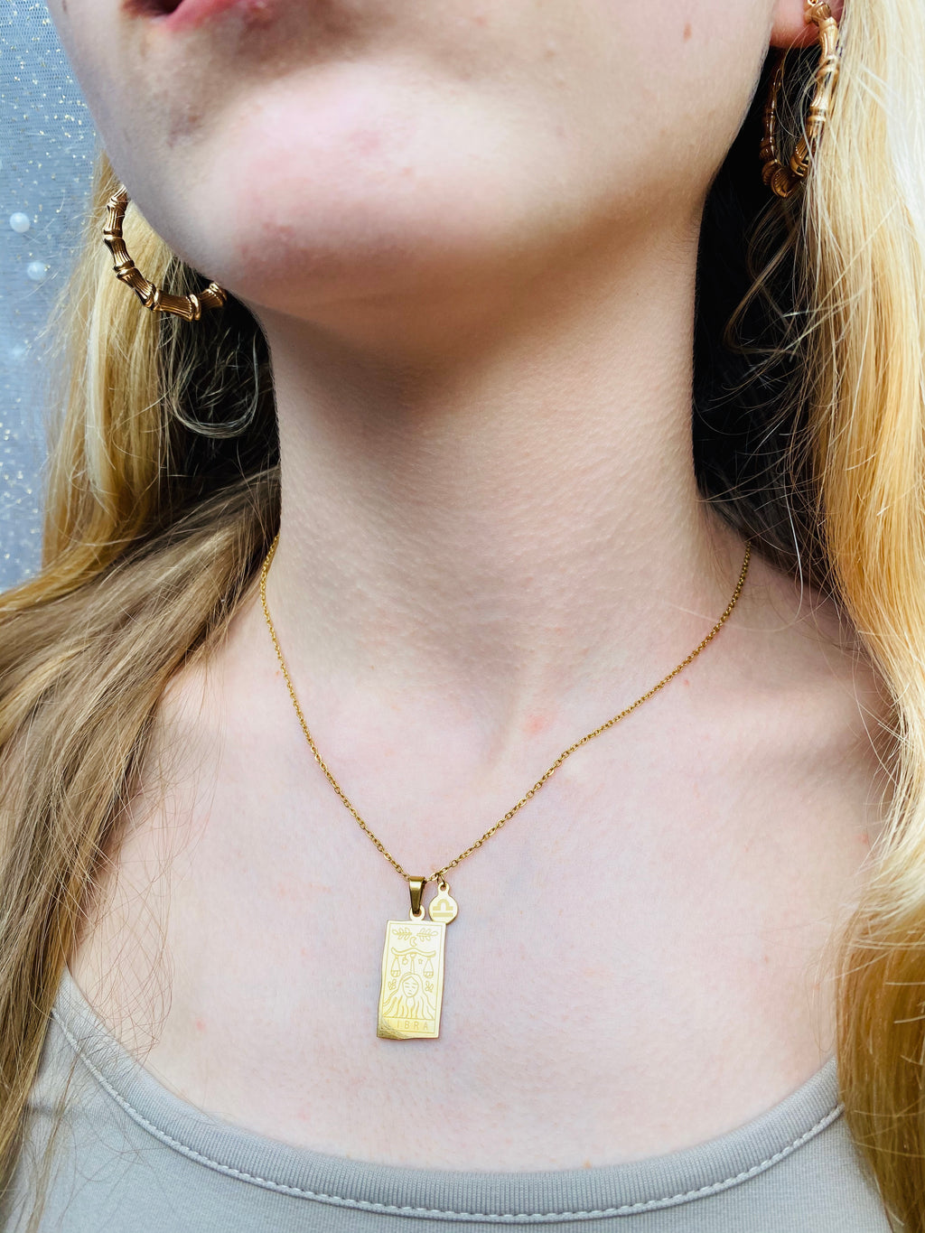 Astraea Gold & Silver Zodiac Pendants
