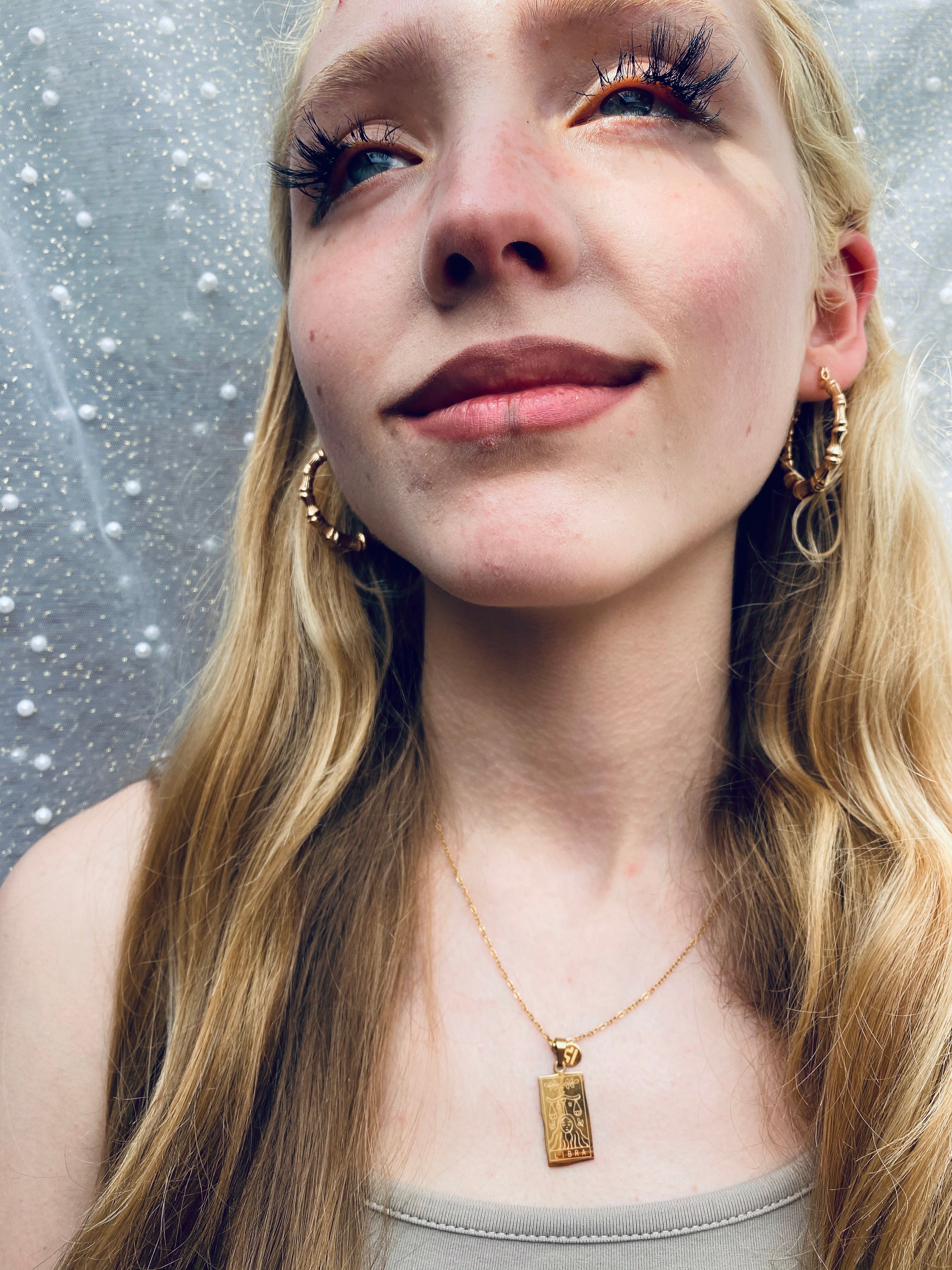 Astraea Gold & Silver Zodiac Pendants