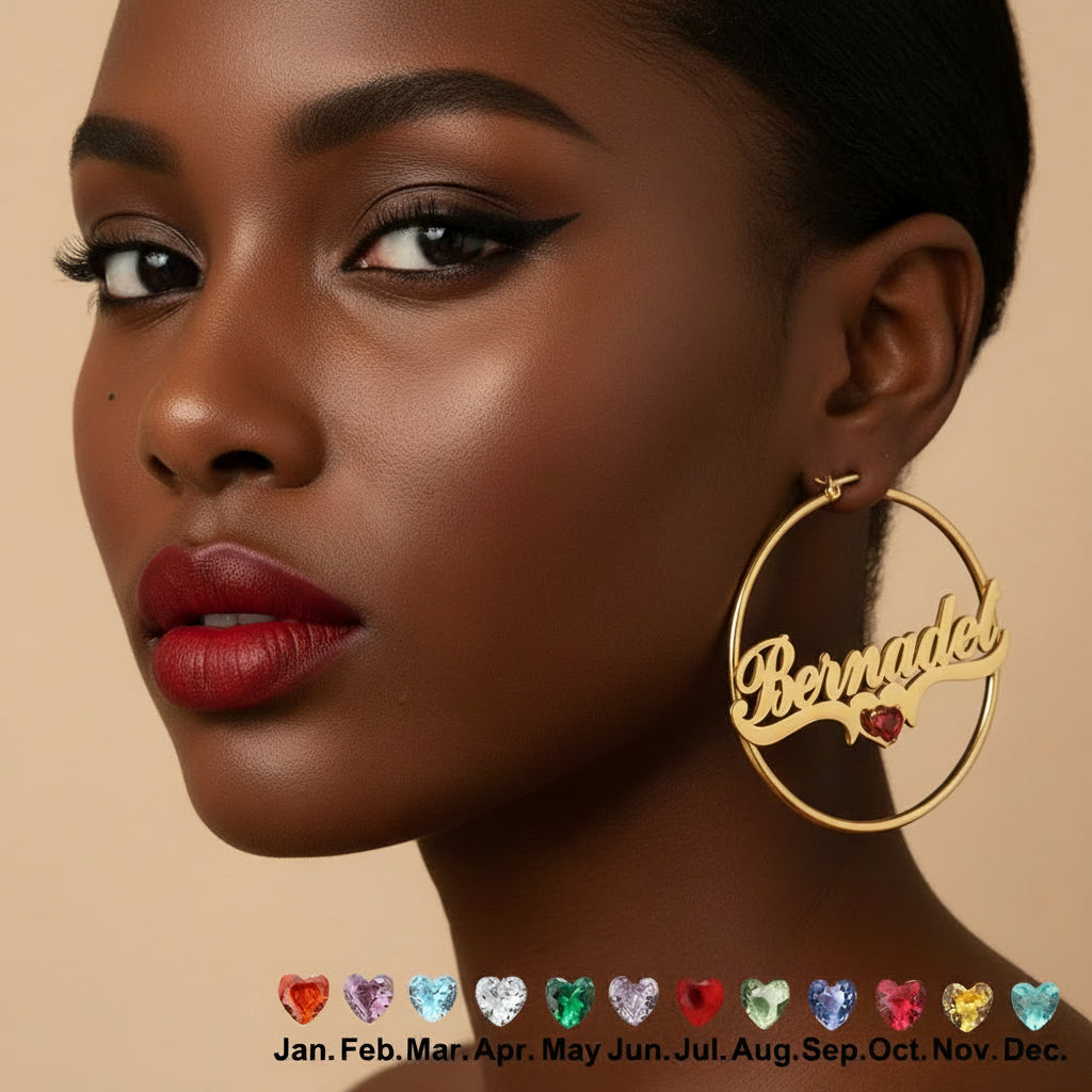 A close-up of a woman wearing a large gold hoop earring with the name 'Bernadet' cut into the front and a small red heart charm. The image includes the text 'Custom Name' and shows a row of colorful heart gem options along the bottom.